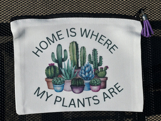 White pouch with cactus illustration and text 'Home is where my plants are'