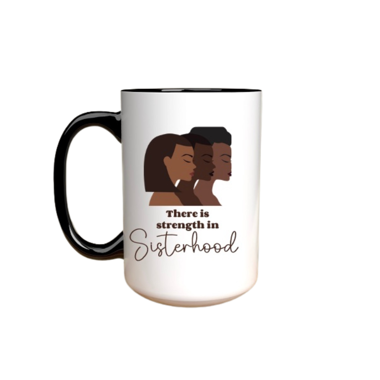 Mug with illustration of three African American women and 'There is strength in sisterhood' text on a white background