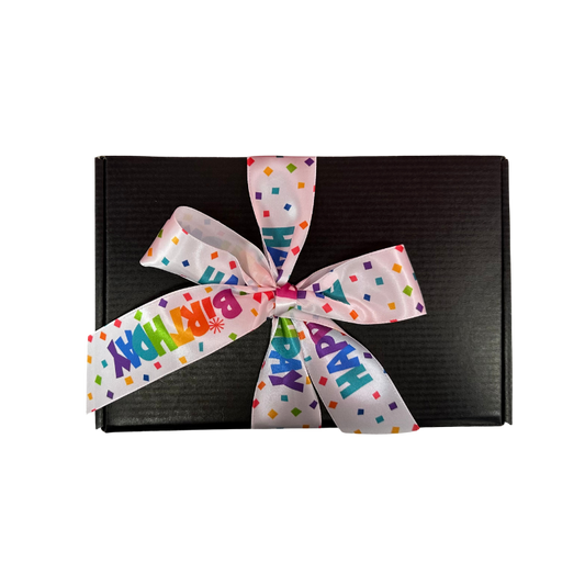 Black gift box with a colorful 'Happy Birthday' ribbon 