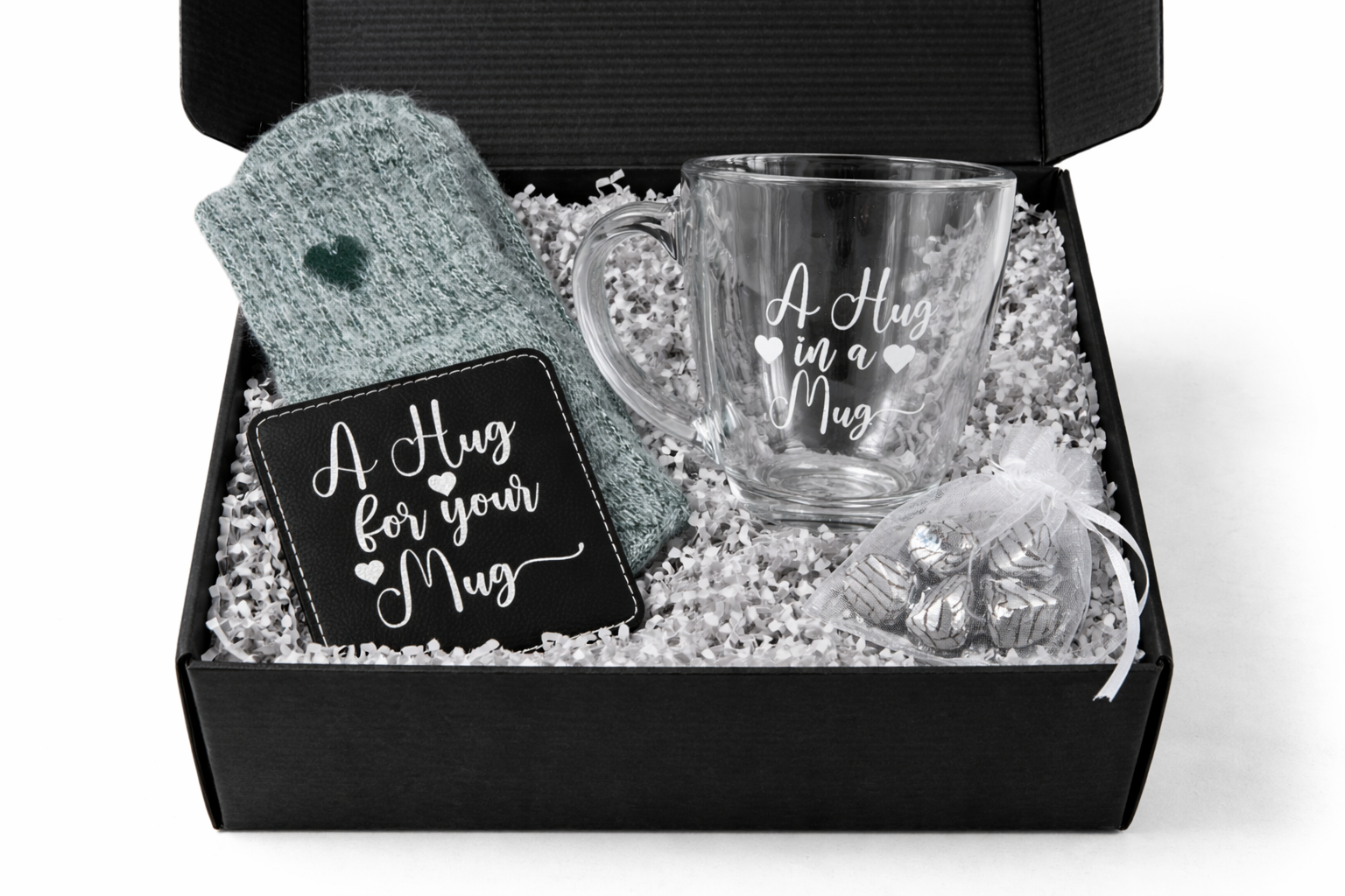 Gift set with mug, socks, and card in a box