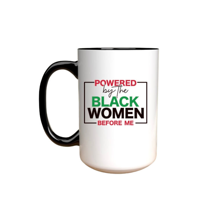White mug with black handle featuring text 'Powered by the Black Women Before Me' 