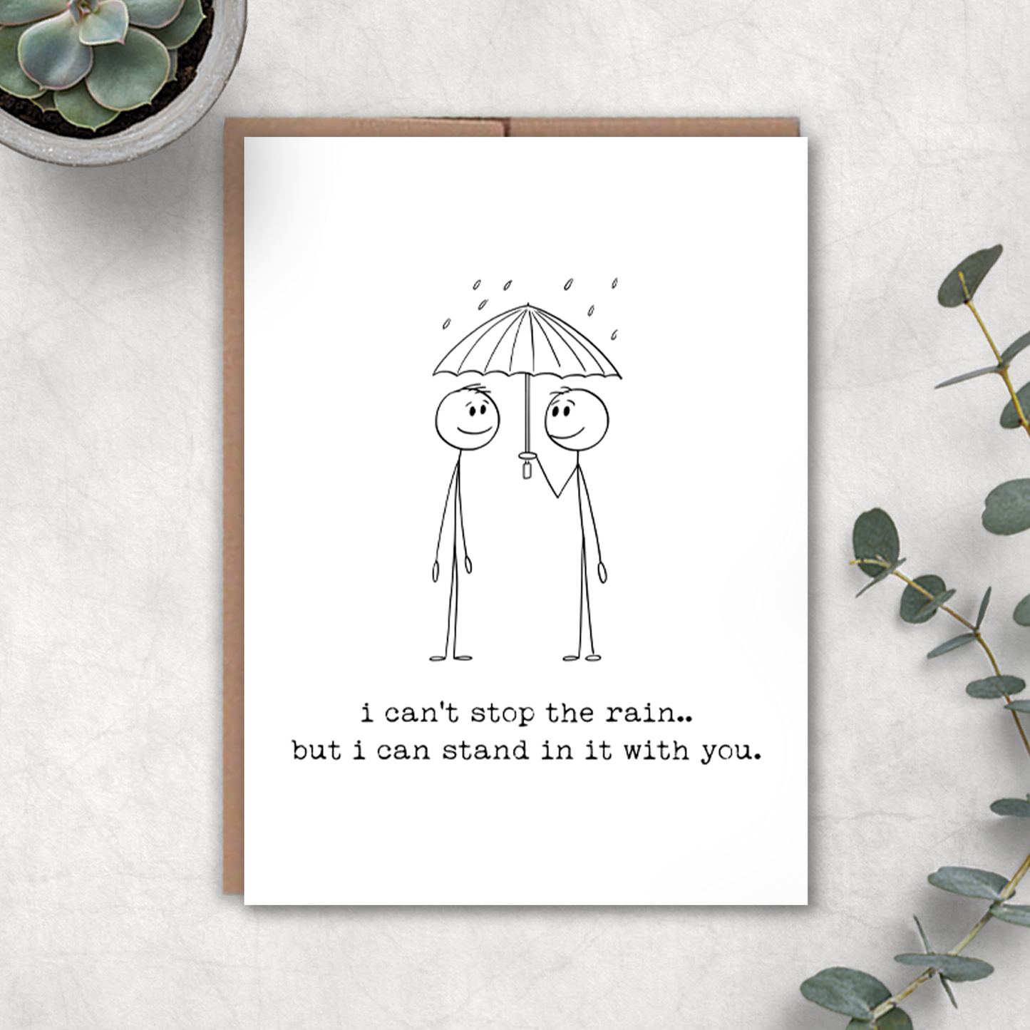Greeting card with stick figure holding an umbrella and text on a white background