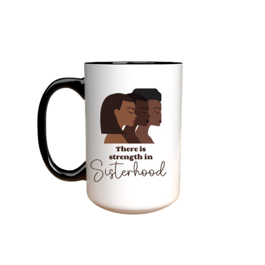 Mug with illustration of three  African American women and 'There is strength in sisterhood' text on a white background