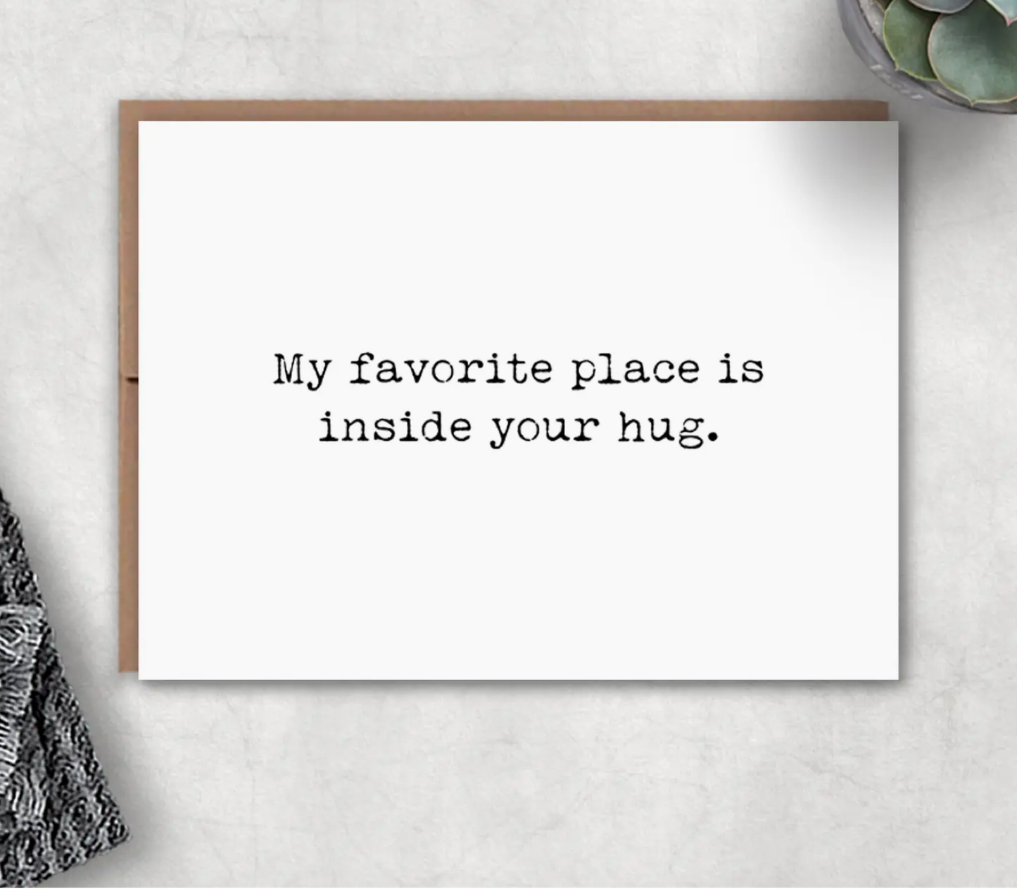 White card with text 'My favorite place is inside your hug.'  l
