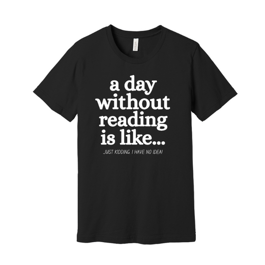 Black t-shirt with white text 'a day without reading is like...'